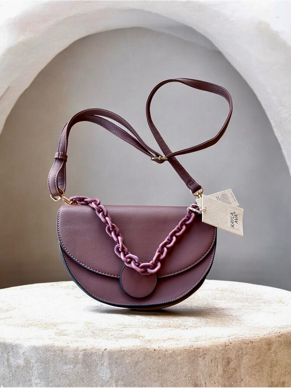 Half moon saddle chain crossbody bag